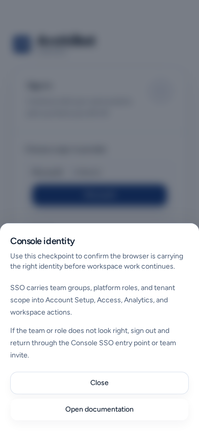 The Console identity help open as a sheet from the bottom of a phone screen, with Close and Open documentation, on safe example data.